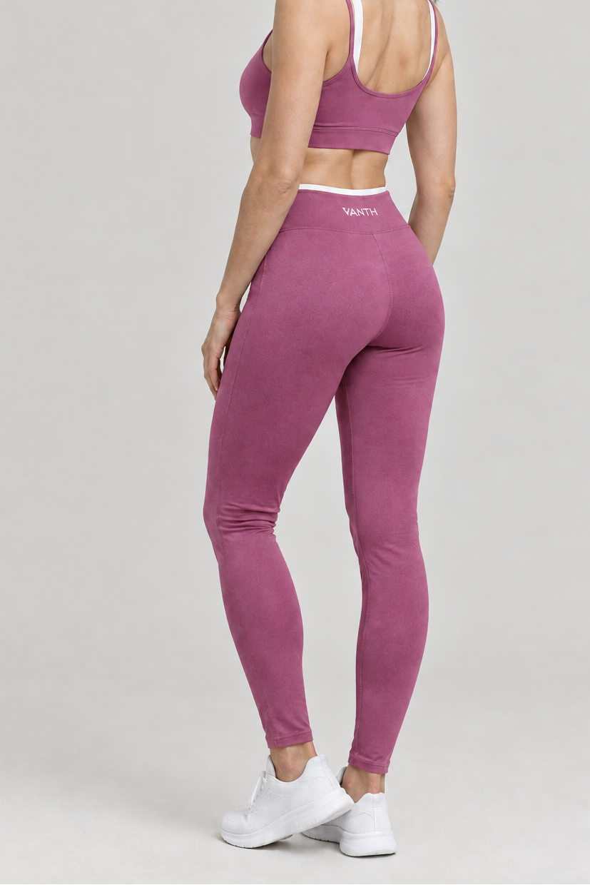 Outfit rosa con logo solo sul retro dei leggings